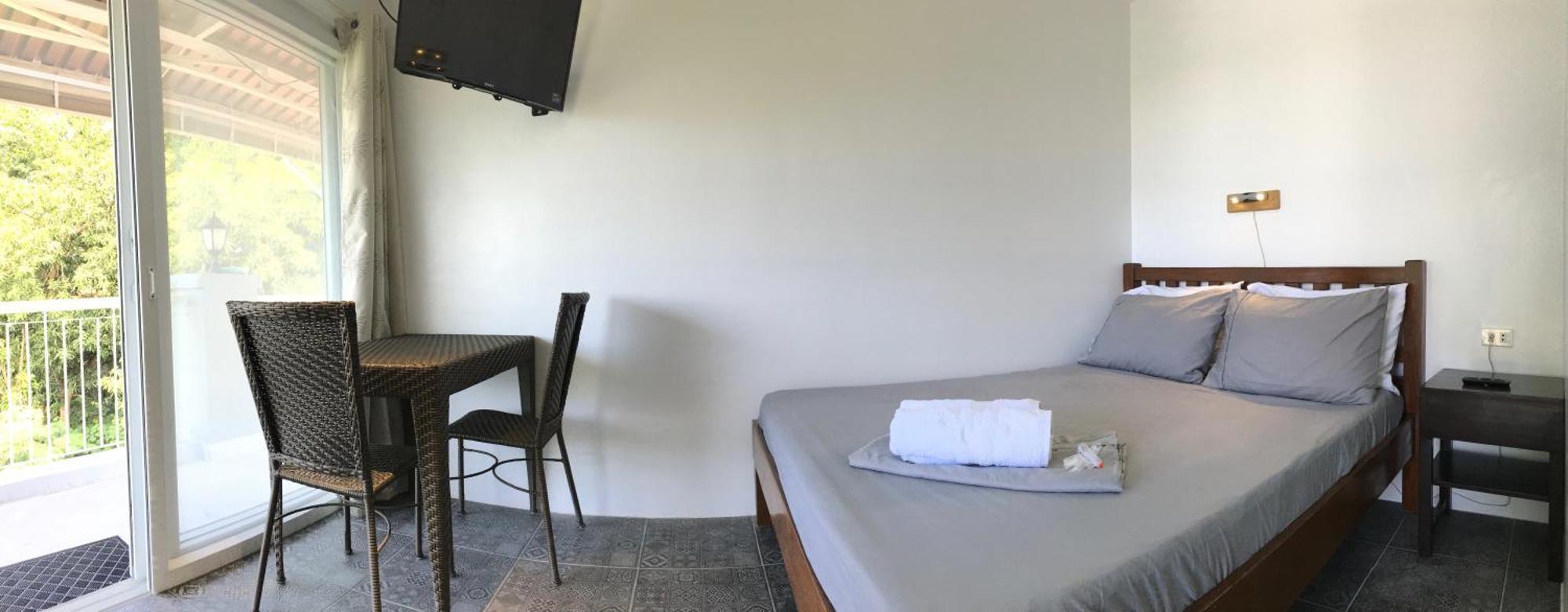 Victoria'S Bed & Breakfast Puerto Galera Rum bild